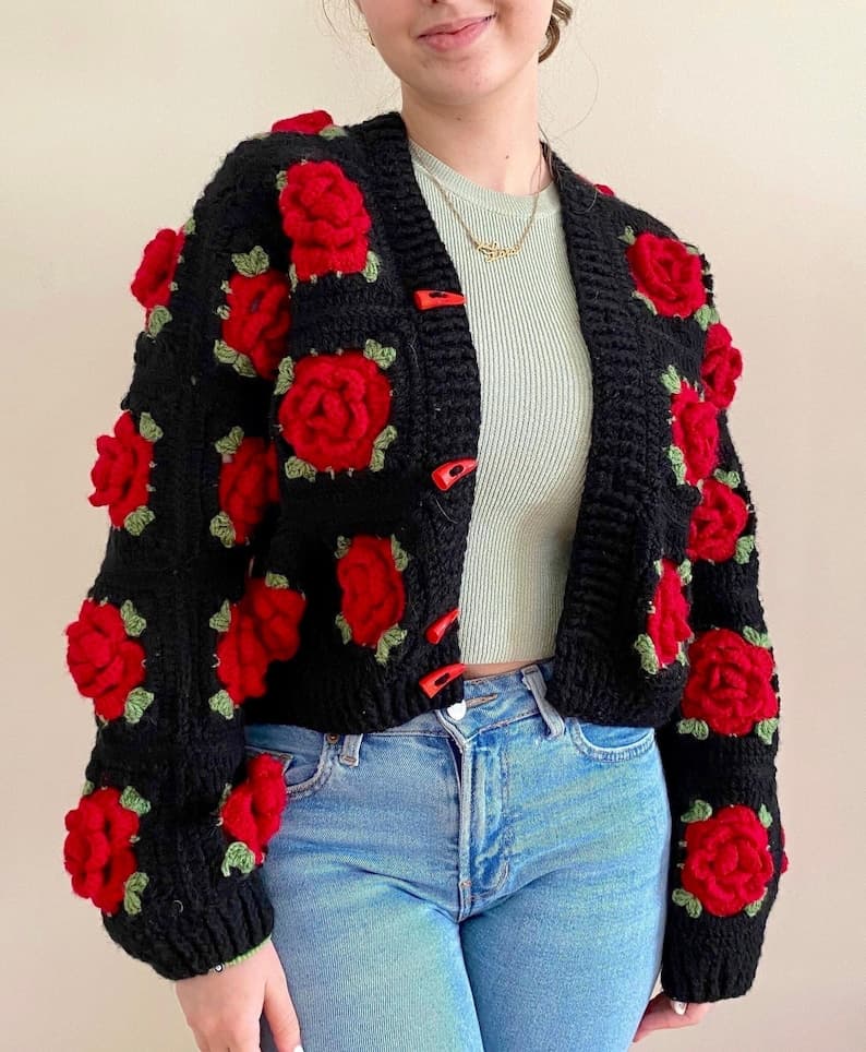 Delicate floral rose embroidery on hand-knitted cream cardigan